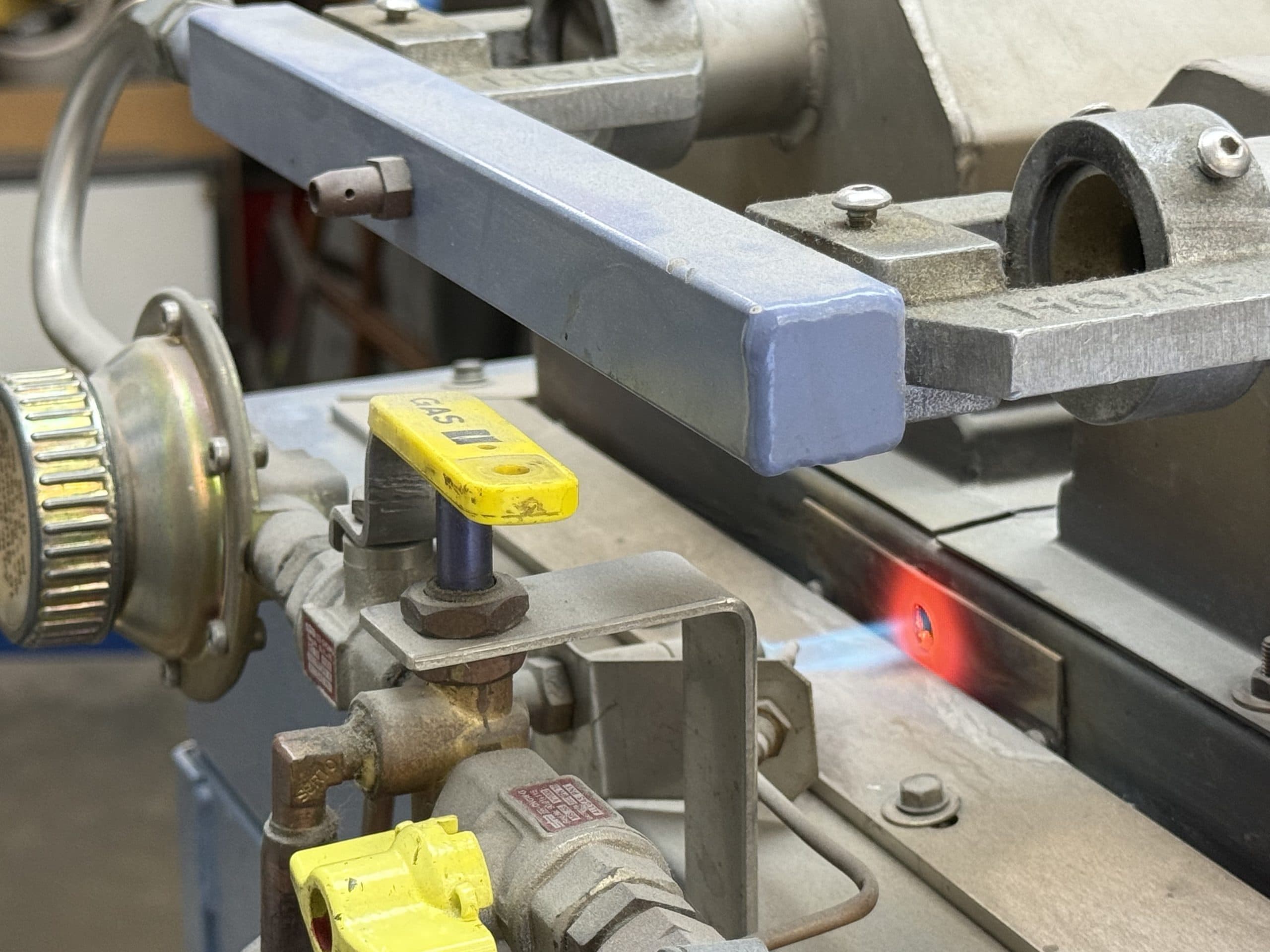 A steel section being cut for one of the window's supporting sub-frames