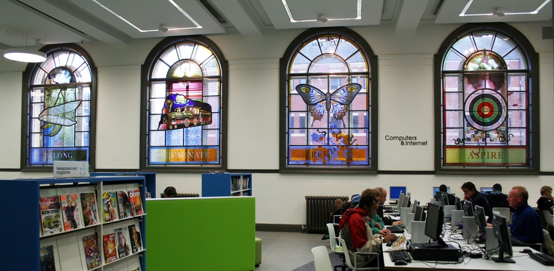 Four of the completed stained-glass windows inside Blackpool Central Library